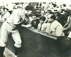 Al Capone with his son and lawyer being greeted by the Cubs' Gabby Hartnett